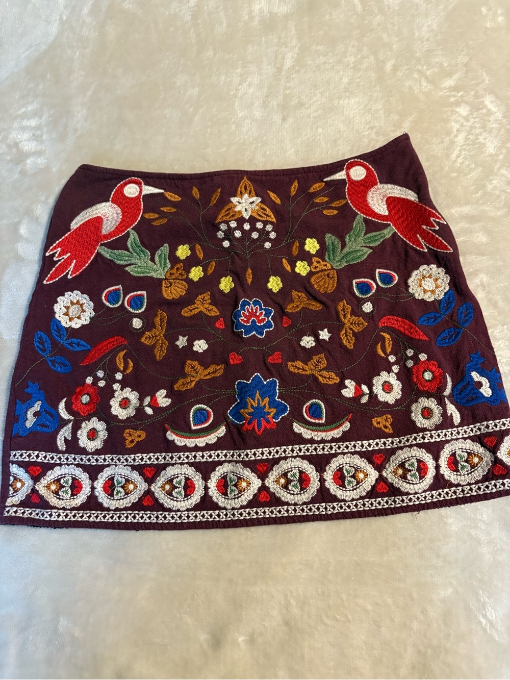 Umgee Maroon Embroidered Mini Skirt with Multicolor Motifs